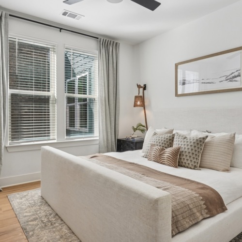 Bedroom with natural lighting and high ceilings