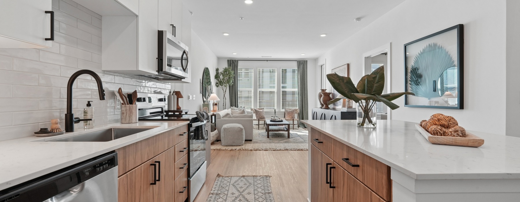 a kitchen with white cabinets